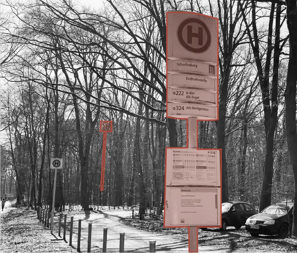 Closed bus stop sign in bare winter woodland, outlined in red