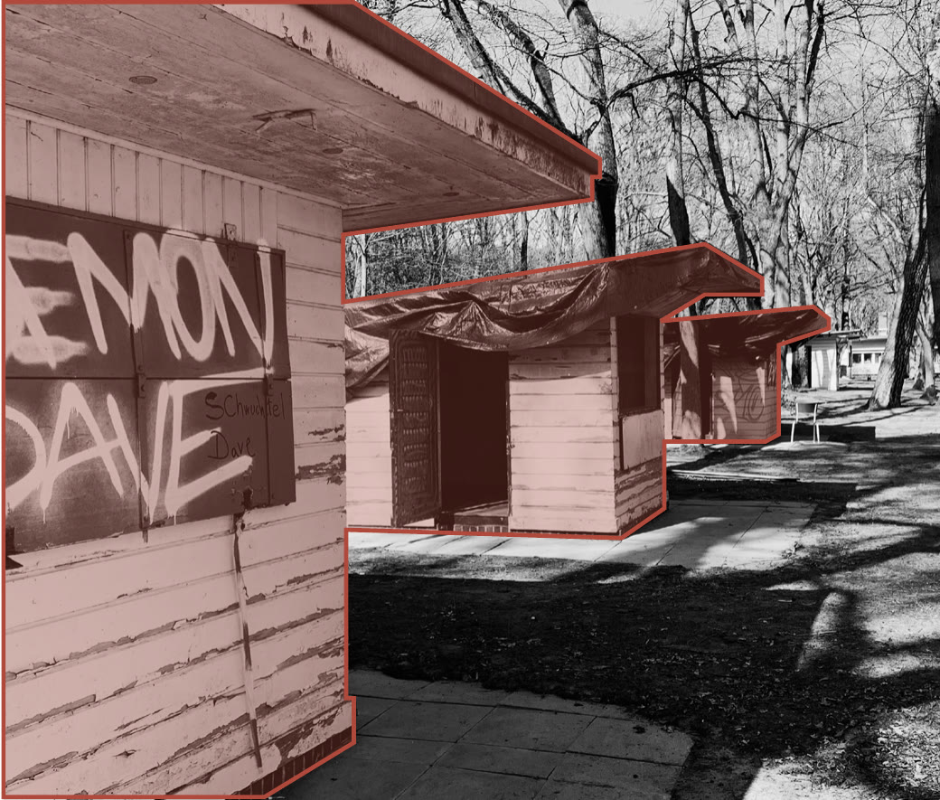 Weathered timber kiosk with graffiti, outlined in red